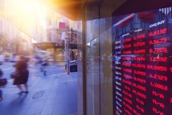 a sign flashes global stock data