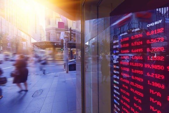 a sign flashes global stock data