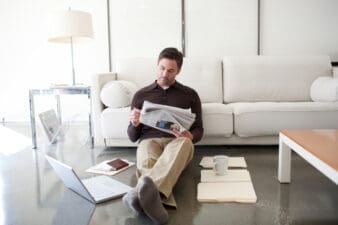 Investor reading the newspaper