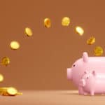 coins jump into piggy bank