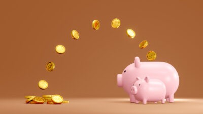 coins jump into piggy bank