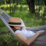 resting in a hammock with eyes closed