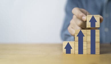 up arrow on wooden blocks