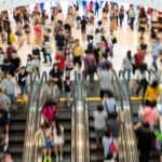 shoppers in an indoor mall