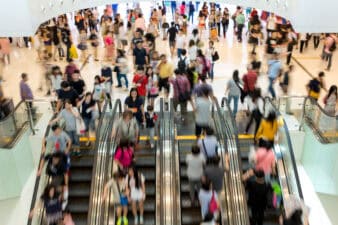 shoppers in an indoor mall