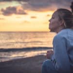 woman looks out at horizon