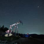 oil pump jack under night sky